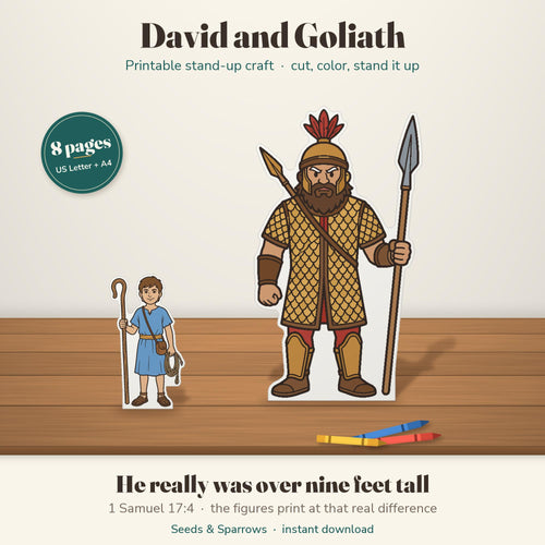 David and Goliath printable stand-up craft: a colored shepherd boy David beside a much taller Goliath on a wooden table; he really was over nine feet tall