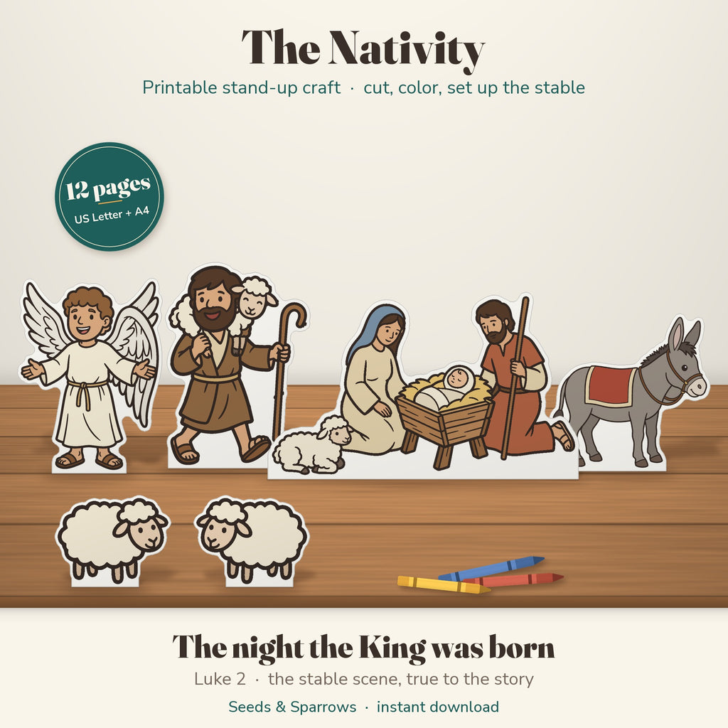Printable nativity stand-up craft for kids: colored paper figures of the angel, a shepherd carrying a lamb, Mary, Joseph, baby Jesus in the manger, a donkey and sheep on a wooden table